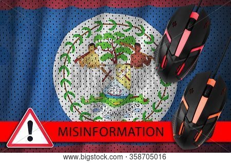 Belize Flag And Two Computer Mouses. Misinformation During Coronavirus Or 2019-ncov Virus Concept