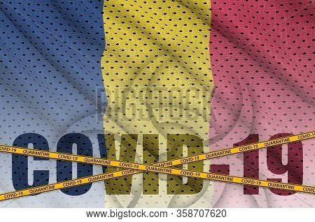 Chad Flag And Covid-19 Inscription With Orange Quarantine Border Tape. Coronavirus Or 2019-ncov Viru