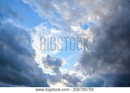 Stormy Sky With Storm Clouns On The Sunset With Beautiful Sun