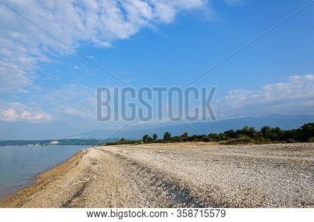 Pebble Beach On The Black Sea Coast With Small Waves