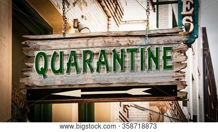 Street Sign To Quarantine Versus Virus