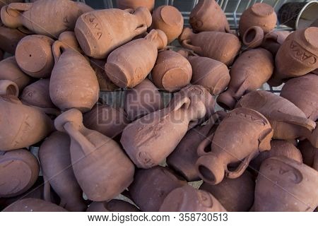 Small Clay Pots, Souvenirs From Cana Galilee In Israel, From The Place Of The Miracle Of Turning Wat