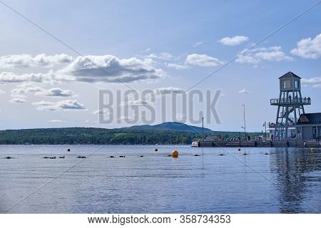 Magog, Quebec, Canada - September 8, 2018: Wharf And Observatory Tower In The Evening On Memphremago