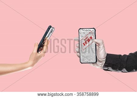 A Man In Medical Gloves Holds A Smartphone With Fake News.on The Left, A Womans Hand Substitutes A S
