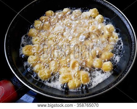 Struffoli Frying At Skillet