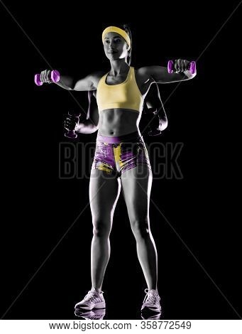 one mixed race woman exercising fitness exercises isolated on black background with lightpainting effect multiple exposures
