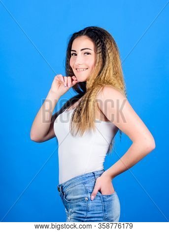 Extra Volume. Styling Cosmetic Product. Crimped Hairstyles. Woman Stylish Hairstyle On Blue Backgrou