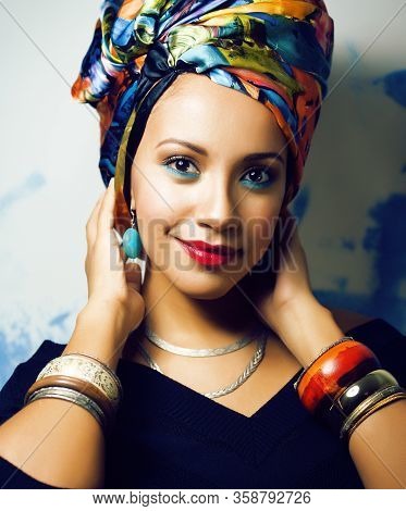 Beauty Bright African Woman With Creative Make Up, Shawl On Head Like Cubian Closeup Smiling