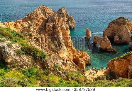 Lagos, Portugal - 6 March 2020: Tourists Visiting Ponta Da Piedade