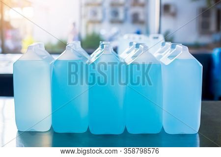 Alcohol For Cleaning And Sanitizing Is Contained In Gallons In The Warehouse. Many Gallon Alcohol Ge