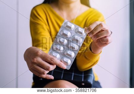 Hands Women Holding A Drud Or Pills Pack,female Suffering From Abdominal Pain And Stomachache
