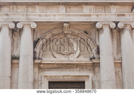 Massonic Eye Sign Inside Triangle On Building Of Church Of St. Magdalena, Canaregio District, Venice
