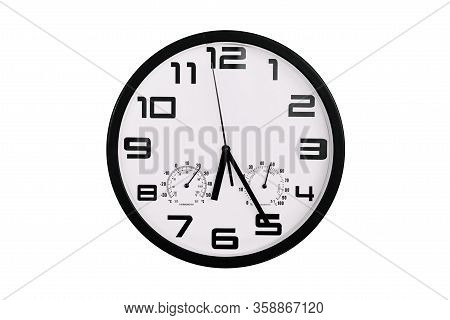 Simple Classic Black And White Round Wall Clock Isolated On White. Clock With Arabic Numerals On Wal