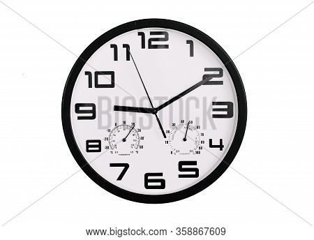 Simple Classic Black And White Round Wall Clock Isolated On White. Clock With Arabic Numerals On Wal