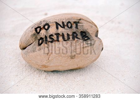 Do Not Disturb Sign On The Beach, Maldives. Privacy Concept.