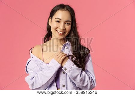 Close-up Portrait Of Tender, Romantic Asian Girl Keep Loving Dearest Memories In Her Heart, Press Ha