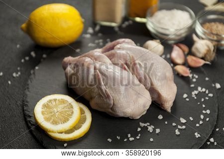 Raw Quail Meat On Kitchen, Cooking Gourmet Bird. Healthy Diet Recipe.