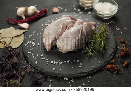 Raw Partridge Meat On Kitchen, Cooking Gourmet Wild Bird. Healthy Diet Recipe.