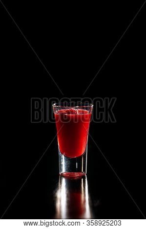 Chocolate Cupcake Dessert With Tart Raspberry Sauce