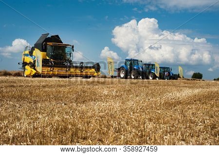 Nastasiv,ternopil,ukraine - July 25, 2019: Tractor And Combine Harvester New Holland At The Annual E