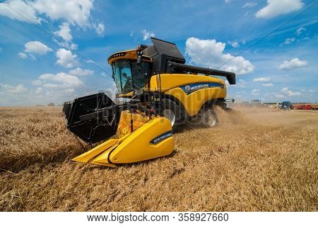 Nastasiv,ternopil,ukraine - July 25, 2019: Tractor And Combine Harvester New Holland At The Exhibiti