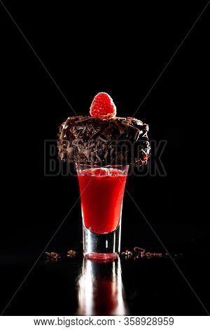 Chocolate Cupcake Dessert With Tart Raspberry Sauce