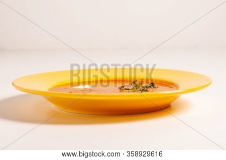 Seasoned Tomato Soup With Avocado And Decorations