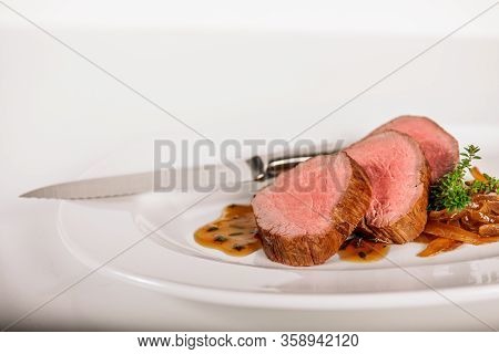 Roasted Beef Steak With Sauce And Vegetables
