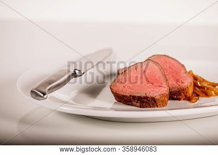 Roasted Beef Steak With Sauce And Vegetables