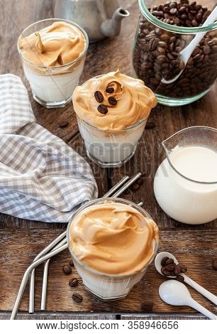 Whipped Coffee In A Glass With Coffee Beans