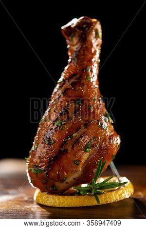 Grilled Chicken Leg On A Decorative Presentation