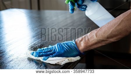Stay Inside And Stay Safe And Clean For The Virus , Wiping Down Surfaces And Disinfecting Table Duri