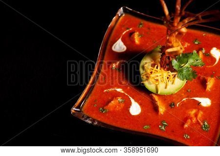 Seasoned Tomato Soup With Avocado And Decorations