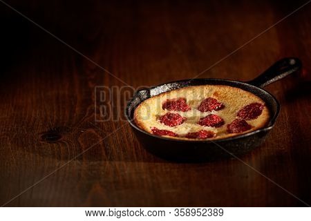 Delicious Raspberry Pancake In Cast Iron Pan