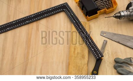 Carpenter At Work, Makes Crafts From Boards And Plywood