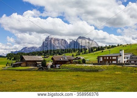 Compatsch Houses With Langkofel And Sella Group Mountains In The Background