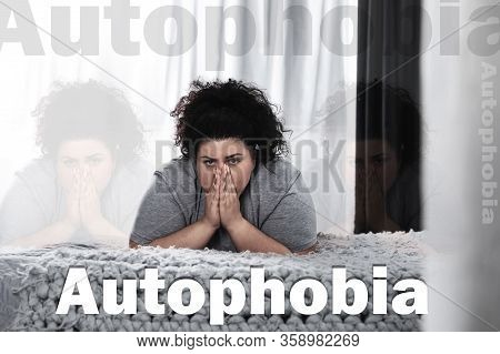 Depressed Overweight Woman Alone On Bed At Home. Autophobia
