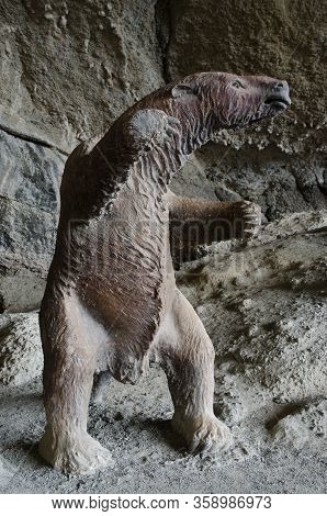 Life size replica of the prehistoric giant ground sloth called Mylodon (Mylodon darwini). Cueva del Milodon Natural Monument. Chile.
