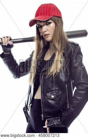 Closeup Of Relaxed Winsome Caucasian Female Baseball Player Posing With Bat On Shoulder While Wearin