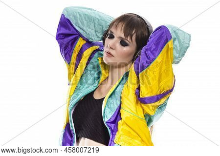 Dreaming Relaxed Winsome Caucasian Female Athlete Sportwoman In Fitness Sexy Outfit Wearing Wireless