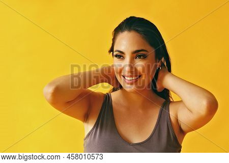 Headshot Beauty Shot Of Hispanic Latina Woman Smiling Young Adult With Hands On Hair Black Long Hair