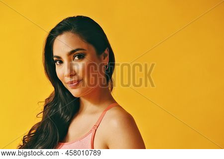 Headshot Beauty Shot Of Thoughtful Hispanic Latina Woman Young Adult With Black Long Hair And Tank T