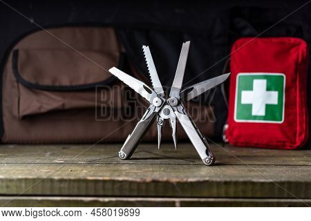 Universal Tool And First Aid Kit. Lots Of Tools In One Item. Multifunctional Tool. Handheld And Comp
