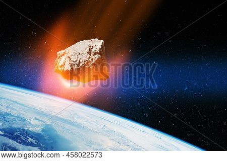 Planet Earth And Big Asteroid In The Space. Potentially Hazardous Asteroids. Asteroid In Outer Space
