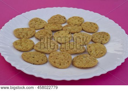 Top View Of Tasty Crispy Farsi F Puri Used For Papdi Chaat, Bhel Puri, Indian Tea Time Nameek Snacks