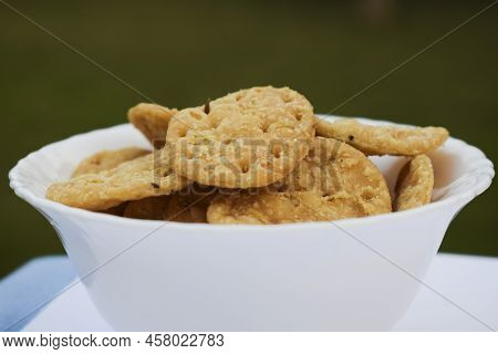 Side View Of Tasty Crispy Farsi F Puri Used For Papdi Chaat, Bhel Puri, Indian Tea Time Nameek Snack