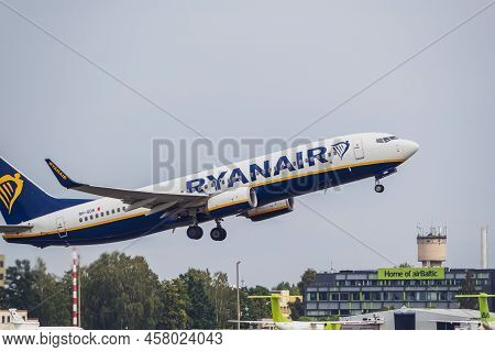 Ryanair Boeing 737-8as Takes Off From The Runway At Riga International Airport. Riga International A
