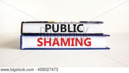 Public Shaming Symbol. Concept Words Public Shaming On Books On A Beautiful White Table White Backgr