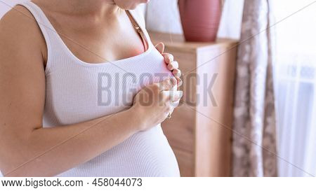 Breast Pain Self Exam. Young Pregnancy Woman Examining Breast For Signs Lumps. Breast Self Exam. Hea