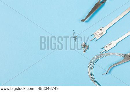 A Set Of Special Tools For An Orthodontist To Install Braces For A Patient. Orthodontic Arcs, Ligatu